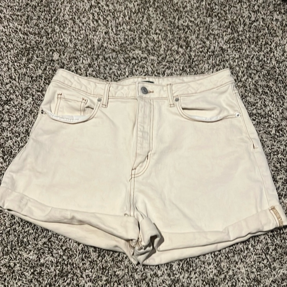 Cream colored high-rise shorts